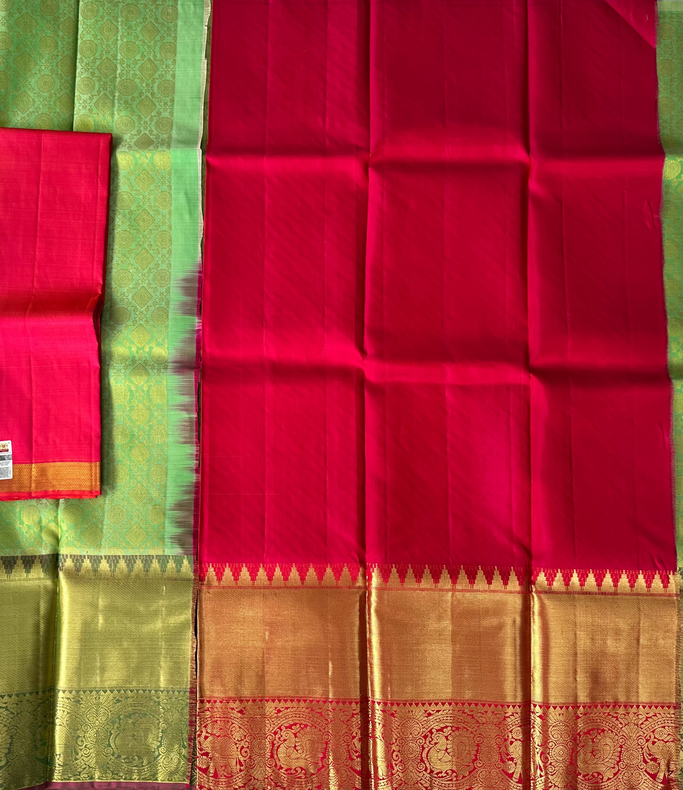 Dharmavaram Parrot Green & Rani Pink Pure Silk Half Saree with Gold-Tone Elephant and Peacock Border