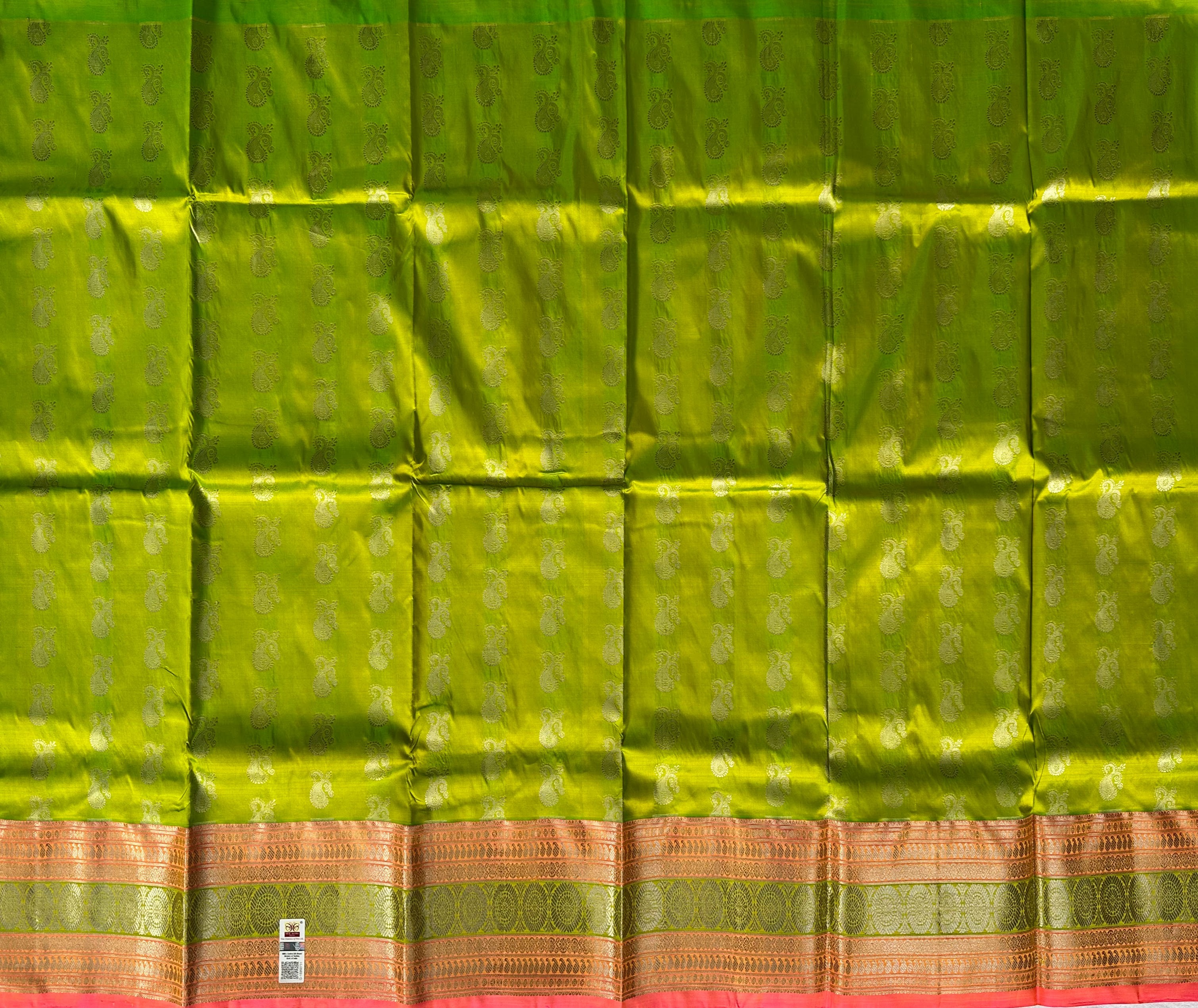 Dharmavaram Parrot Green & Rani Pink Pure Silk Pattu Pavada with Gold-Tone Zari Paisleys