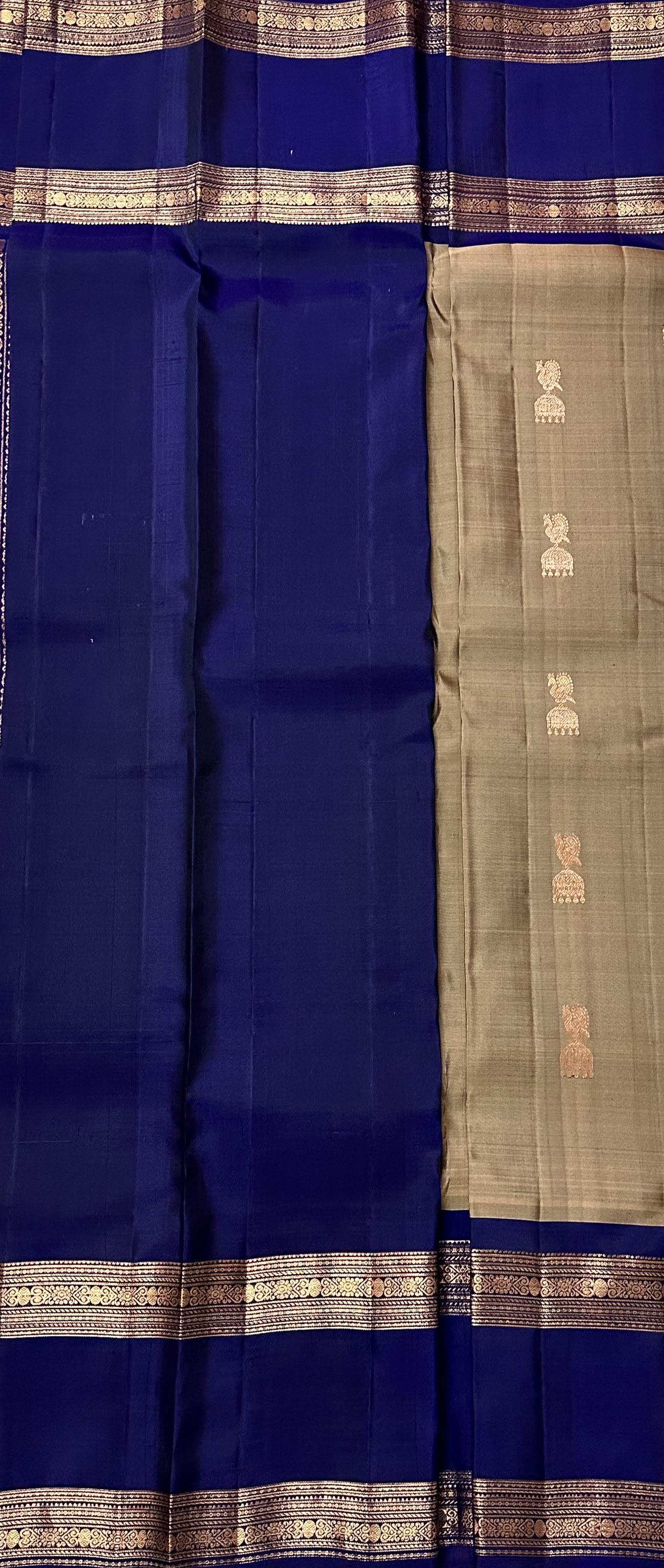 Dharmavaram Beige & Royal Blue Pure Silk Saree with Copper-Tone Zari Peacock Jhumka Motifs